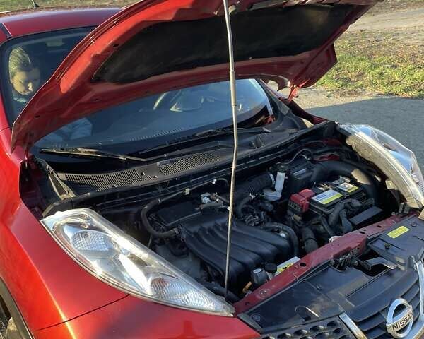 Красный Ниссан Жук, объемом двигателя 1.6 л и пробегом 105 тыс. км за 11300 $, фото 10 на Automoto.ua