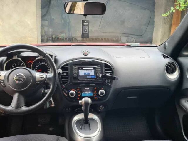 Красный Ниссан Жук, объемом двигателя 1.6 л и пробегом 56 тыс. км за 11500 $, фото 5 на Automoto.ua