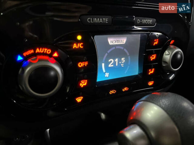 Червоний Ніссан Жук, об'ємом двигуна 1.6 л та пробігом 120 тис. км за 10000 $, фото 9 на Automoto.ua