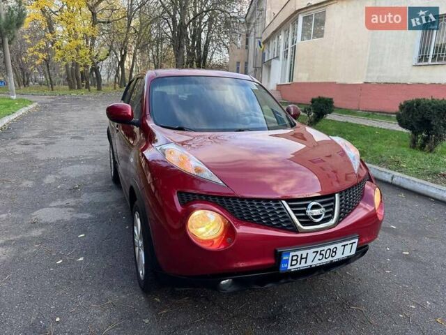 Красный Ниссан Жук, объемом двигателя 1.6 л и пробегом 170 тыс. км за 10300 $, фото 6 на Automoto.ua