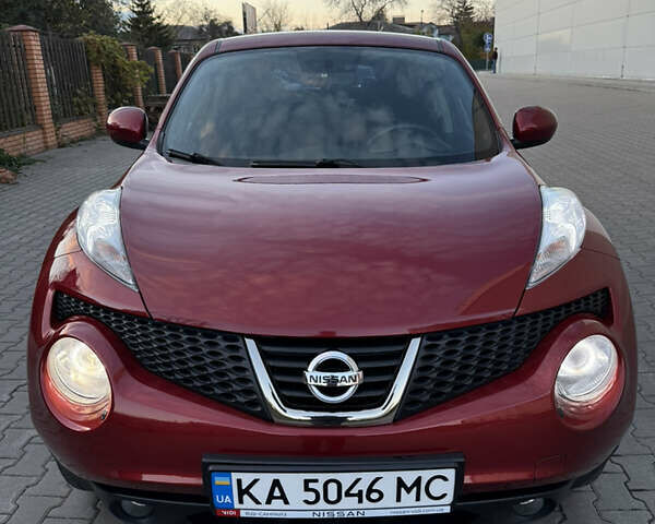 Червоний Ніссан Жук, об'ємом двигуна 1.6 л та пробігом 54 тис. км за 11800 $, фото 1 на Automoto.ua