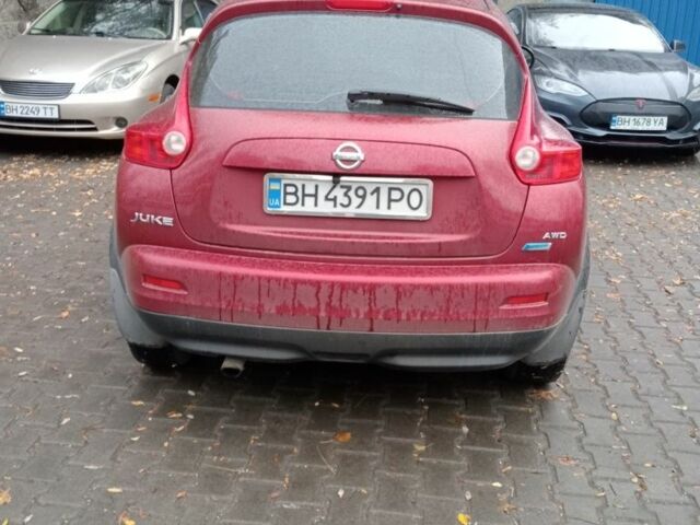 Красный Ниссан Жук, объемом двигателя 2 л и пробегом 126 тыс. км за 8900 $, фото 2 на Automoto.ua