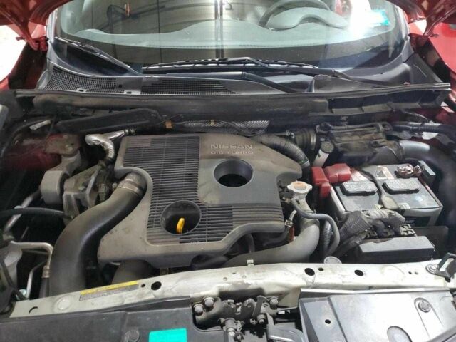 Красный Ниссан Жук, объемом двигателя 1.6 л и пробегом 45 тыс. км за 600 $, фото 11 на Automoto.ua