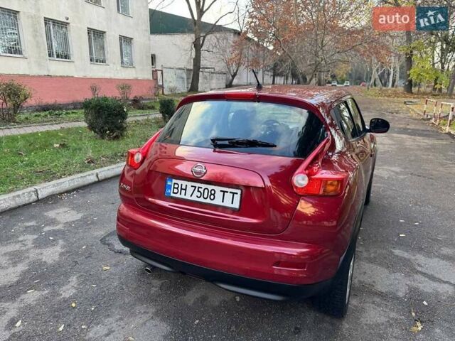 Красный Ниссан Жук, объемом двигателя 1.6 л и пробегом 170 тыс. км за 10300 $, фото 16 на Automoto.ua