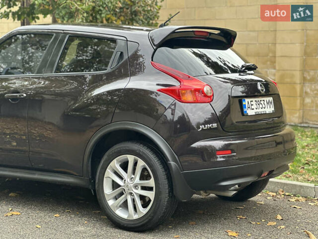 Ниссан Жук 2013 в Днепре (Днепропетровске) на Automoto.ua Красный Ниссан Жук, объемом двигателя 1.6 л и пробегом 116 тыс. км за 12000 $, фото 10 на Automoto.ua