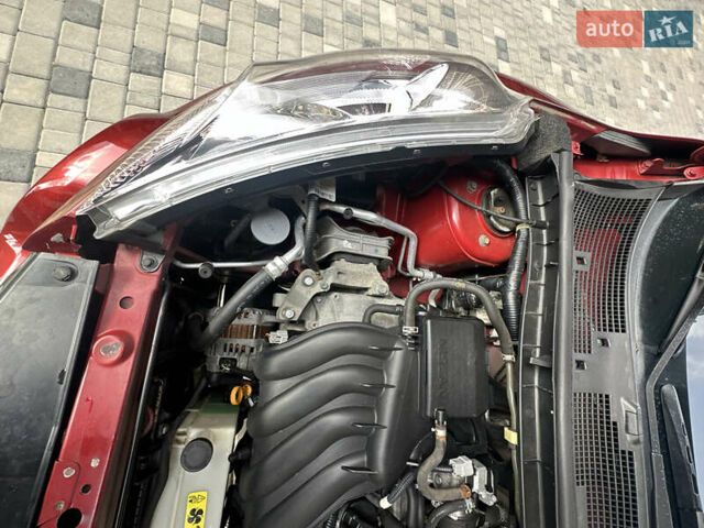 Червоний Ніссан Жук, об'ємом двигуна 1.6 л та пробігом 102 тис. км за 8950 $, фото 11 на Automoto.ua