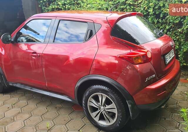 Червоний Ніссан Жук, об'ємом двигуна 1.6 л та пробігом 56 тис. км за 11500 $, фото 7 на Automoto.ua