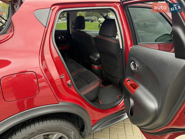 Червоний Ніссан Жук, об'ємом двигуна 1.6 л та пробігом 151 тис. км за 9900 $, фото 19 на Automoto.ua