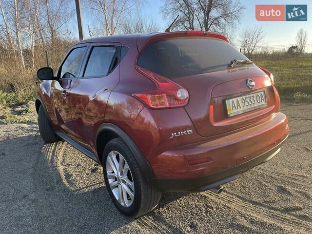 Красный Ниссан Жук, объемом двигателя 1.6 л и пробегом 105 тыс. км за 11300 $, фото 2 на Automoto.ua