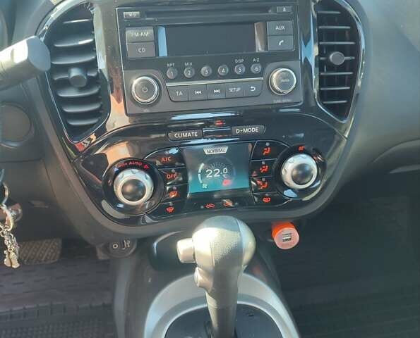 Червоний Ніссан Жук, об'ємом двигуна 1.6 л та пробігом 122 тис. км за 10200 $, фото 9 на Automoto.ua