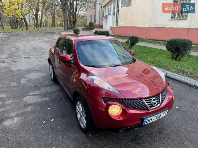 Красный Ниссан Жук, объемом двигателя 1.6 л и пробегом 170 тыс. км за 10300 $, фото 8 на Automoto.ua