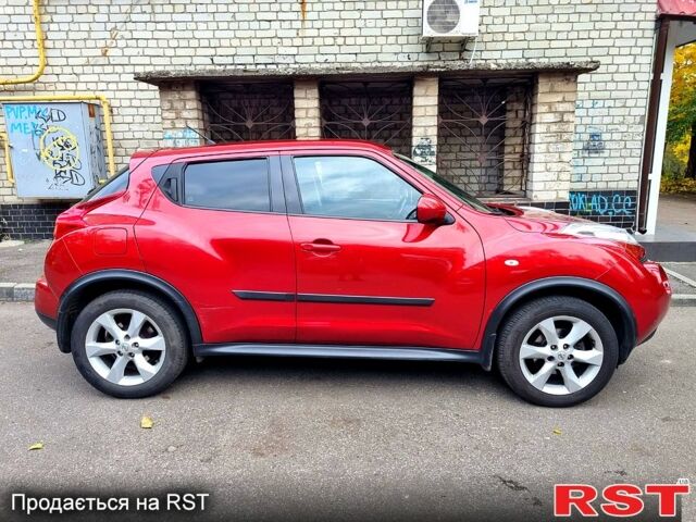 Красный Ниссан Жук, объемом двигателя 1.6 л и пробегом 130 тыс. км за 10700 $, фото 6 на Automoto.ua