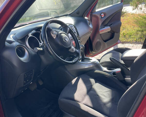 Червоний Ніссан Жук, об'ємом двигуна 1.6 л та пробігом 94 тис. км за 11500 $, фото 19 на Automoto.ua