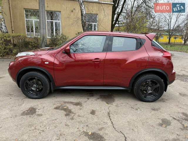 Красный Ниссан Жук, объемом двигателя 1.6 л и пробегом 130 тыс. км за 10500 $, фото 26 на Automoto.ua