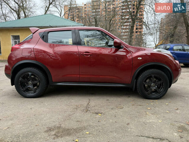 Красный Ниссан Жук, объемом двигателя 1.6 л и пробегом 130 тыс. км за 10500 $, фото 12 на Automoto.ua