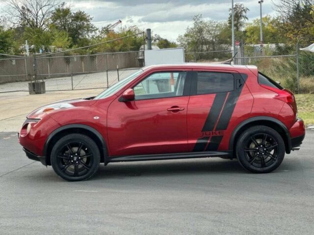 Червоний Ніссан Жук, об'ємом двигуна 1.6 л та пробігом 89 тис. км за 5500 $, фото 4 на Automoto.ua