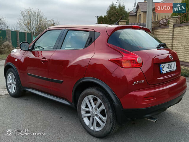 Червоний Ніссан Жук, об'ємом двигуна 1.6 л та пробігом 66 тис. км за 11000 $, фото 20 на Automoto.ua