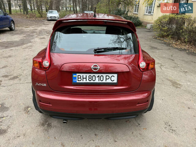 Красный Ниссан Жук, объемом двигателя 1.6 л и пробегом 130 тыс. км за 10500 $, фото 18 на Automoto.ua