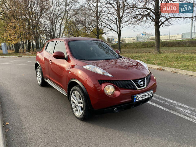 Красный Ниссан Жук, объемом двигателя 1.62 л и пробегом 68 тыс. км за 12200 $, фото 11 на Automoto.ua