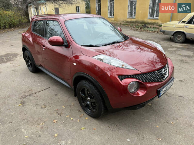 Красный Ниссан Жук, объемом двигателя 1.6 л и пробегом 130 тыс. км за 10500 $, фото 6 на Automoto.ua