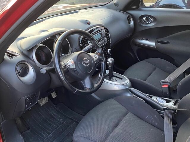 Красный Ниссан Жук, объемом двигателя 1.6 л и пробегом 76 тыс. км за 10700 $, фото 6 на Automoto.ua