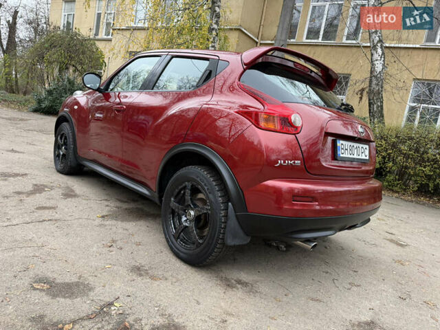 Красный Ниссан Жук, объемом двигателя 1.6 л и пробегом 130 тыс. км за 10500 $, фото 28 на Automoto.ua