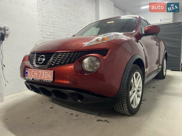Красный Ниссан Жук, объемом двигателя 1.6 л и пробегом 165 тыс. км за 8200 $, фото 1 на Automoto.ua