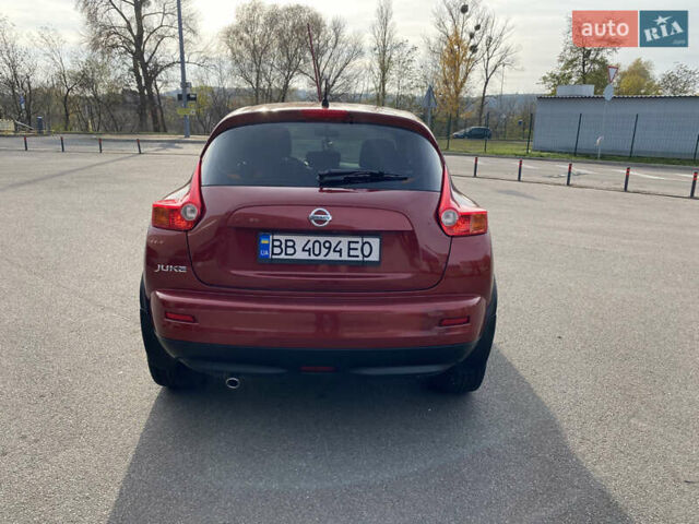 Красный Ниссан Жук, объемом двигателя 1.62 л и пробегом 68 тыс. км за 12200 $, фото 4 на Automoto.ua