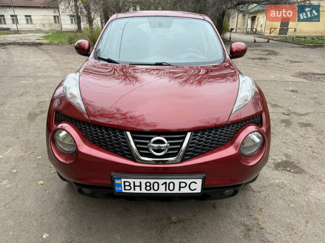 Красный Ниссан Жук, объемом двигателя 1.6 л и пробегом 130 тыс. км за 10500 $, фото 5 на Automoto.ua