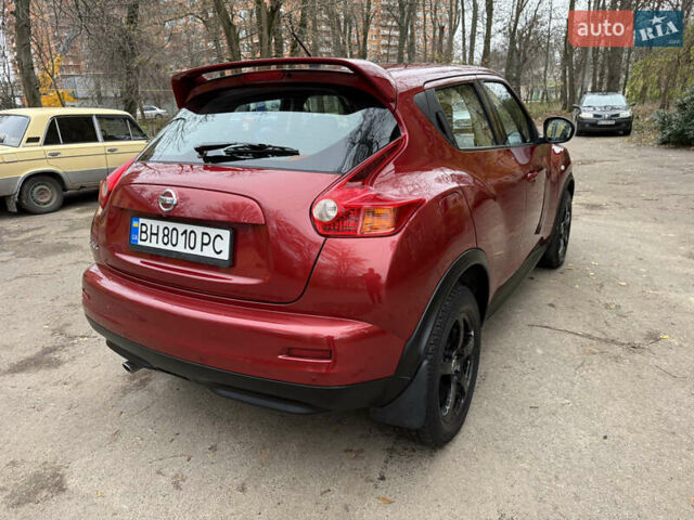 Красный Ниссан Жук, объемом двигателя 1.6 л и пробегом 130 тыс. км за 10500 $, фото 13 на Automoto.ua