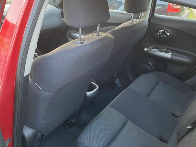 Красный Ниссан Жук, объемом двигателя 1.6 л и пробегом 76 тыс. км за 10700 $, фото 5 на Automoto.ua