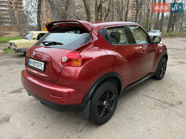 Красный Ниссан Жук, объемом двигателя 1.6 л и пробегом 130 тыс. км за 10500 $, фото 15 на Automoto.ua