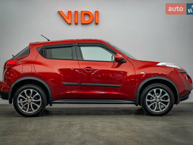 Красный Ниссан Жук, объемом двигателя 1.6 л и пробегом 84 тыс. км за 12272 $, фото 3 на Automoto.ua