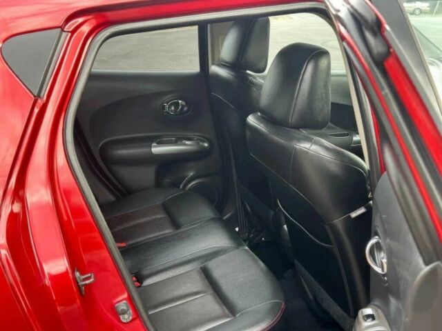 Червоний Ніссан Жук, об'ємом двигуна 1.6 л та пробігом 89 тис. км за 5500 $, фото 10 на Automoto.ua