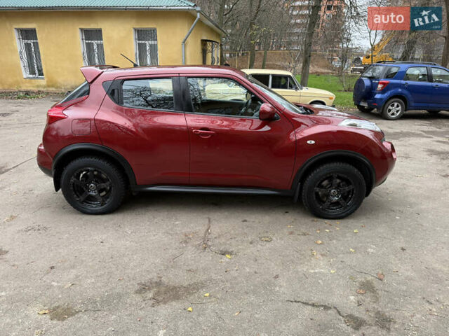 Красный Ниссан Жук, объемом двигателя 1.6 л и пробегом 130 тыс. км за 10500 $, фото 9 на Automoto.ua