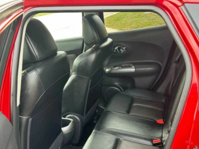 Червоний Ніссан Жук, об'ємом двигуна 1.6 л та пробігом 89 тис. км за 5500 $, фото 11 на Automoto.ua