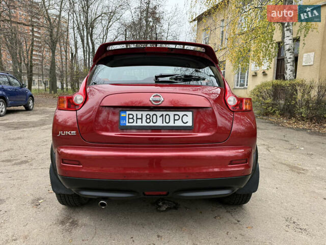 Красный Ниссан Жук, объемом двигателя 1.6 л и пробегом 130 тыс. км за 10500 $, фото 19 на Automoto.ua