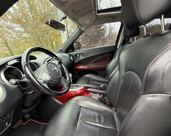 Красный Ниссан Жук, объемом двигателя 1.62 л и пробегом 209 тыс. км за 10500 $, фото 6 на Automoto.ua