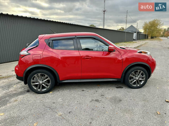 Красный Ниссан Жук, объемом двигателя 1.6 л и пробегом 115 тыс. км за 12000 $, фото 6 на Automoto.ua