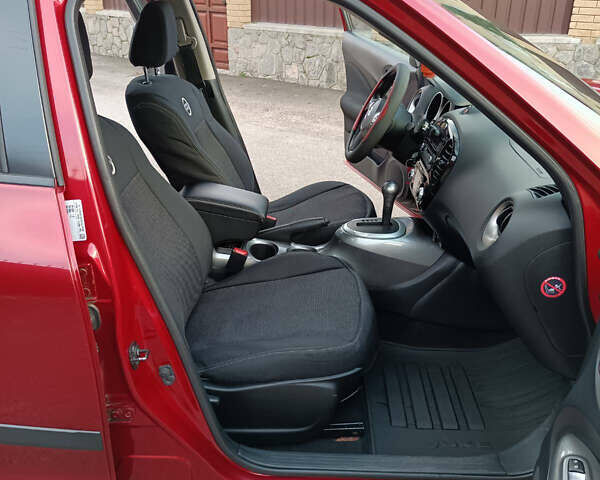 Червоний Ніссан Жук, об'ємом двигуна 1.6 л та пробігом 66 тис. км за 11000 $, фото 8 на Automoto.ua