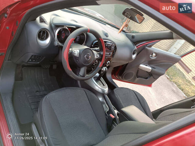 Червоний Ніссан Жук, об'ємом двигуна 1.6 л та пробігом 66 тис. км за 11000 $, фото 10 на Automoto.ua