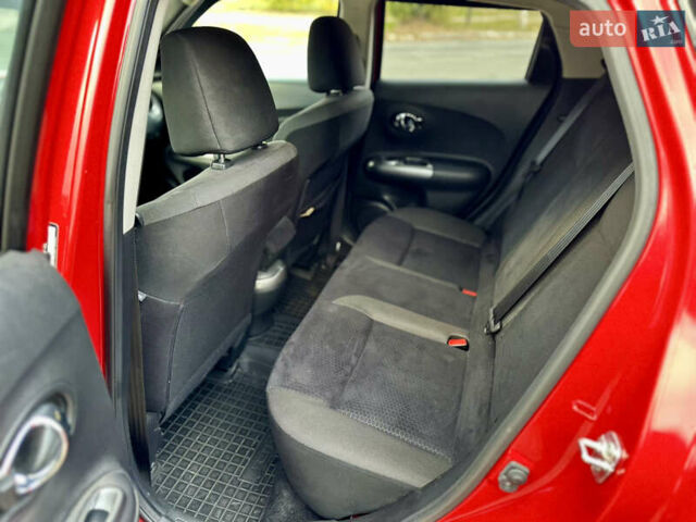 Красный Ниссан Жук, объемом двигателя 1.6 л и пробегом 115 тыс. км за 12000 $, фото 11 на Automoto.ua