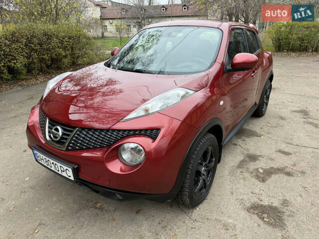 Красный Ниссан Жук, объемом двигателя 1.6 л и пробегом 130 тыс. км за 10500 $, фото 3 на Automoto.ua