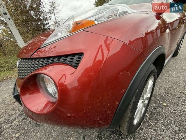Красный Ниссан Жук, объемом двигателя 1.62 л и пробегом 209 тыс. км за 10500 $, фото 5 на Automoto.ua