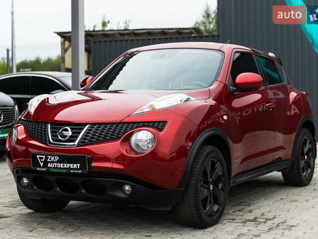 Красный Ниссан Жук, объемом двигателя 1.6 л и пробегом 88 тыс. км за 12400 $, фото 6 на Automoto.ua