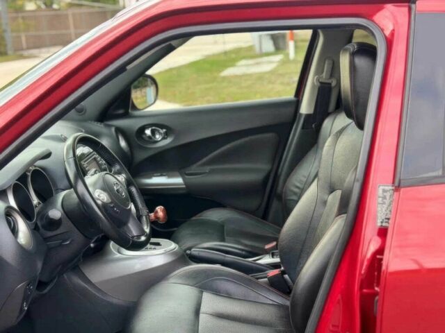 Червоний Ніссан Жук, об'ємом двигуна 1.6 л та пробігом 89 тис. км за 5500 $, фото 9 на Automoto.ua