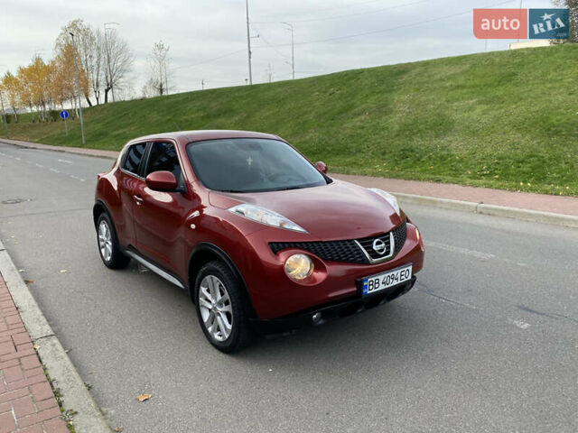 Красный Ниссан Жук, объемом двигателя 1.62 л и пробегом 68 тыс. км за 12200 $, фото 13 на Automoto.ua