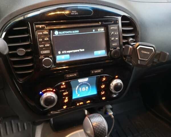 Красный Ниссан Жук, объемом двигателя 1.62 л и пробегом 94 тыс. км за 10800 $, фото 1 на Automoto.ua