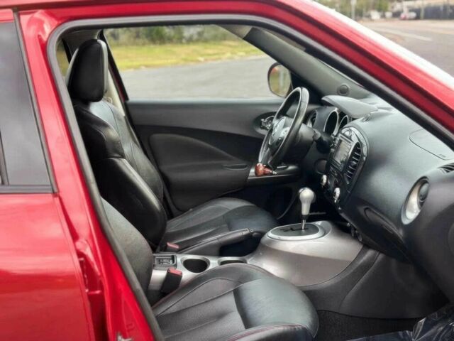 Червоний Ніссан Жук, об'ємом двигуна 1.6 л та пробігом 89 тис. км за 5500 $, фото 8 на Automoto.ua