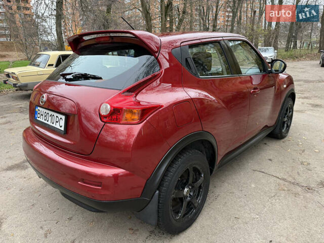 Красный Ниссан Жук, объемом двигателя 1.6 л и пробегом 130 тыс. км за 10500 $, фото 14 на Automoto.ua